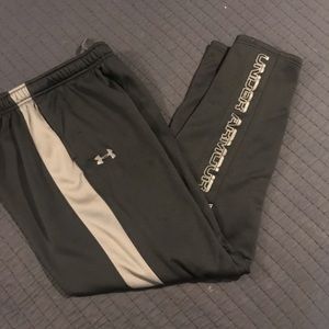 Under Armour black with gray strip down side.